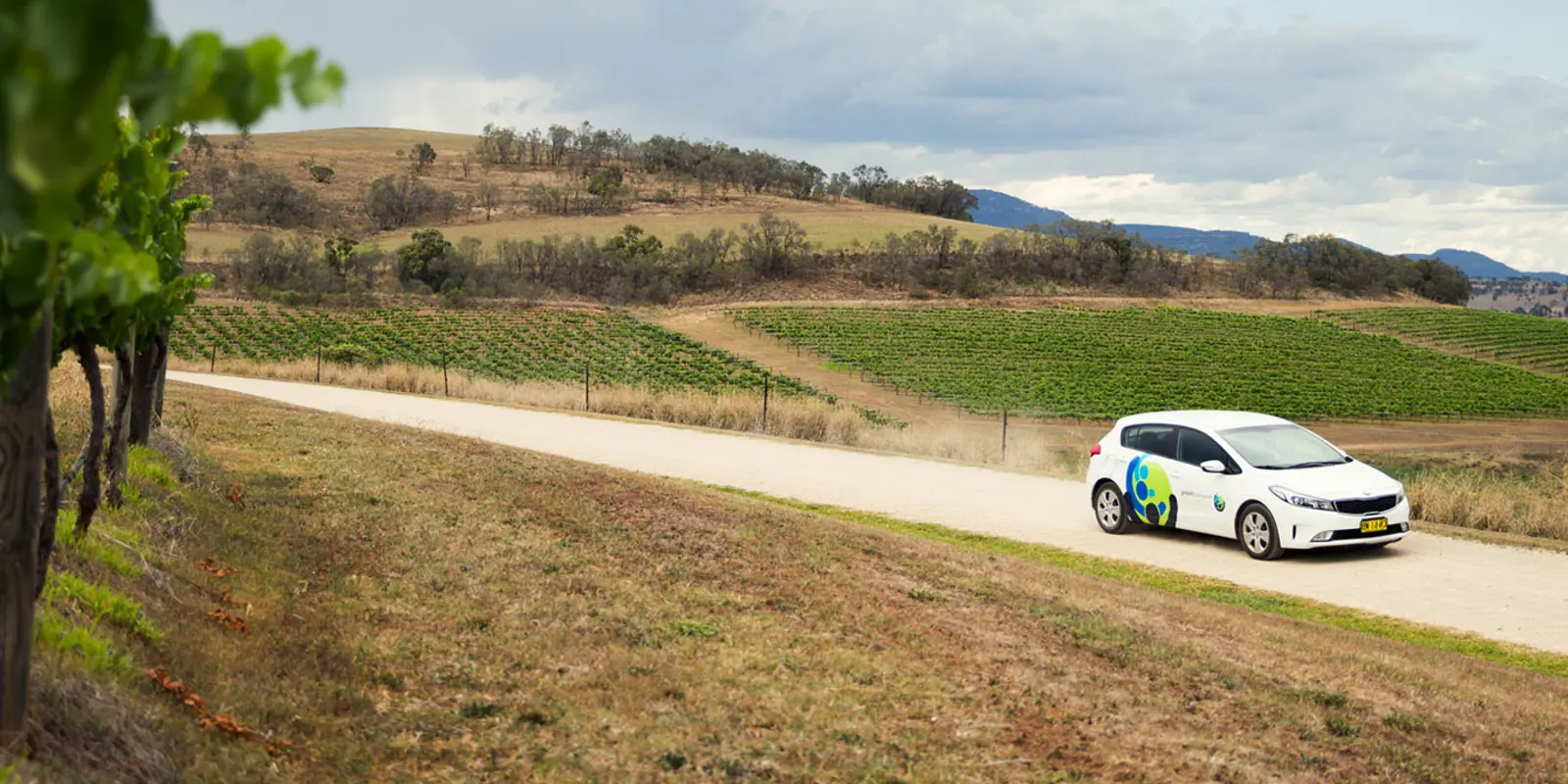 integratedliving car driving down dirt road