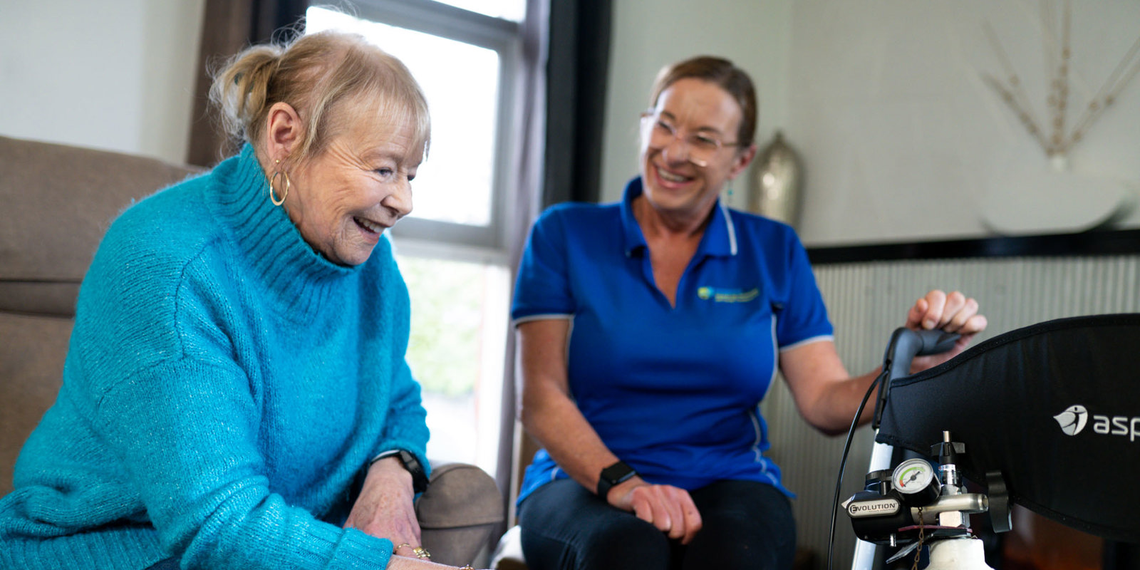 elderly lady at home with support worker