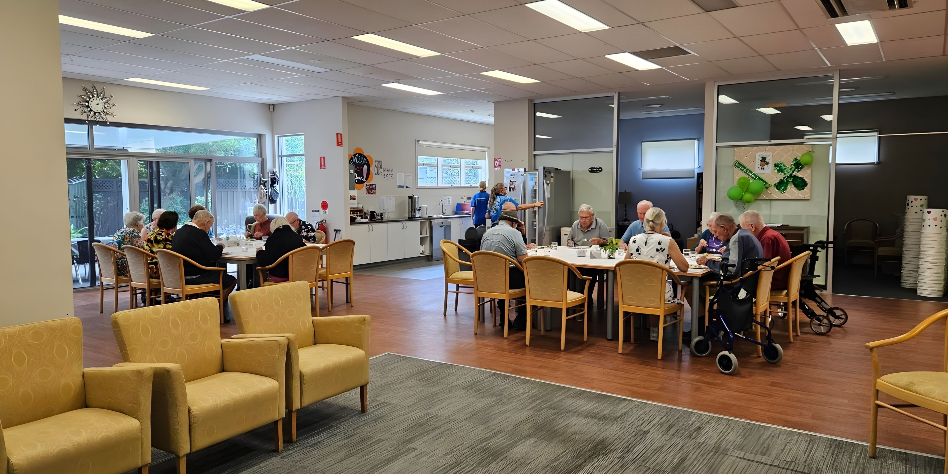 Activity Centre clients at Woy Woy sitting having lunch together